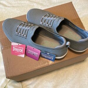 Size 7 Skechers gray slip on shoes